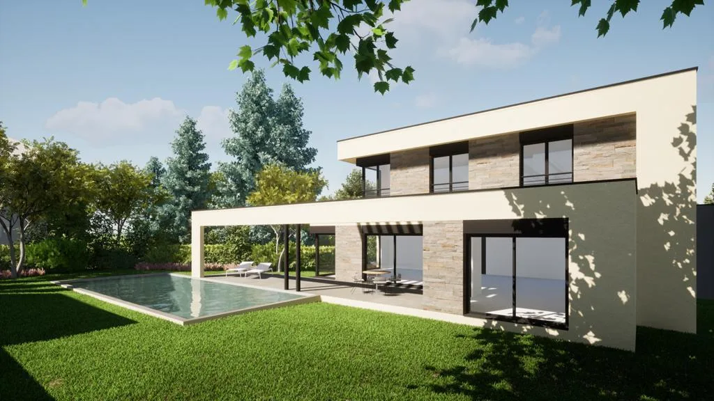 Fachada al jardín, con la piscina en primer término